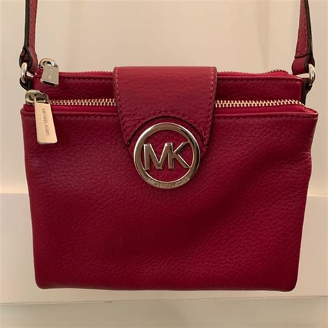 silver michael kors raspberry crossbody bag